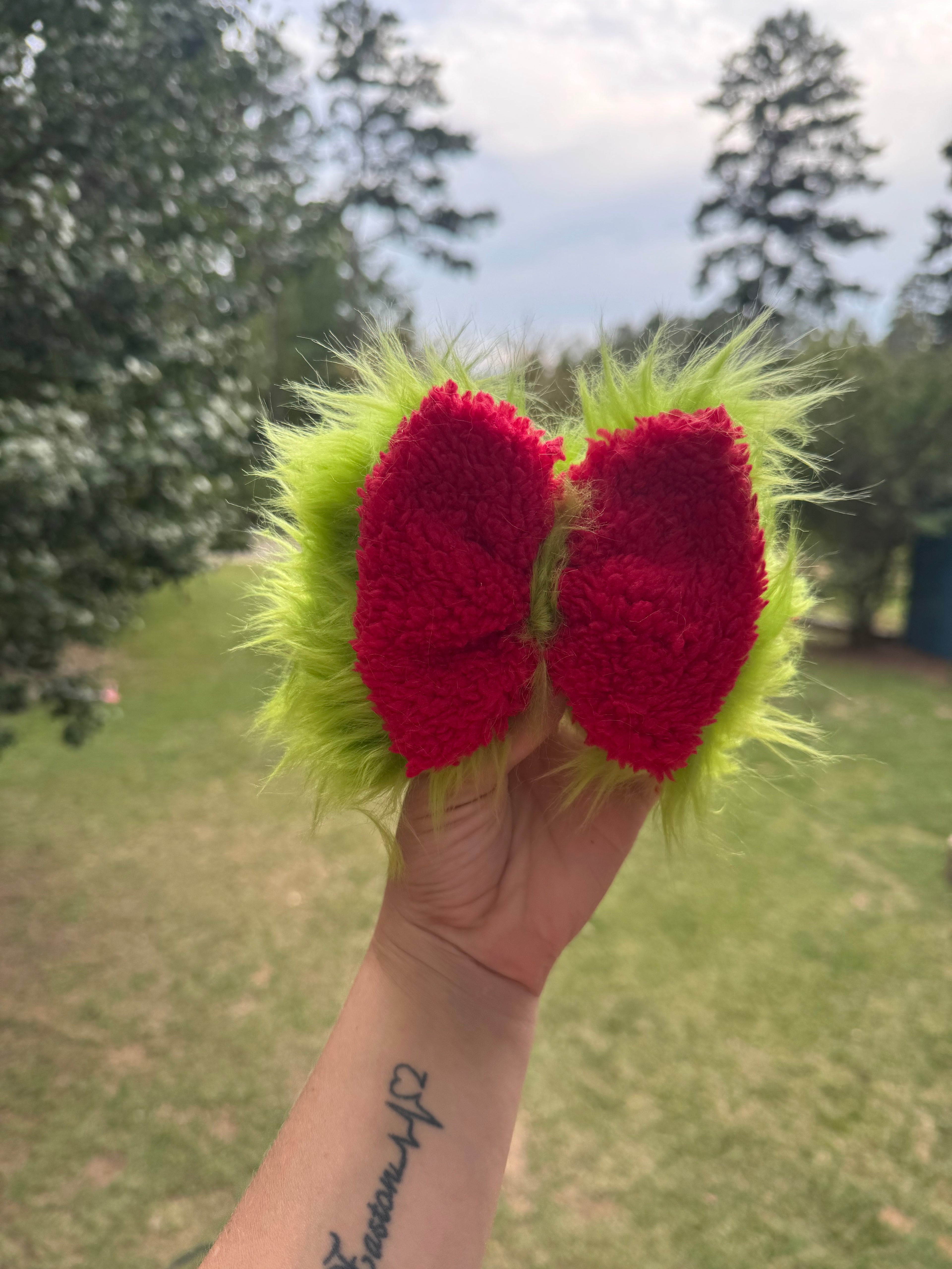 Furry green with red stacked bow